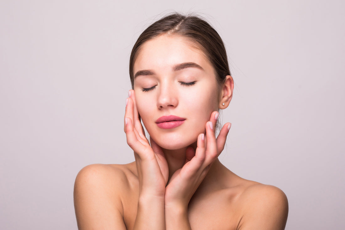 Woman considering whether collagen supplements are good for skin health